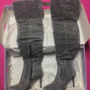 Women’s size 9 silver sparkly high heel boots